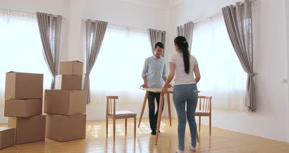 Young Happy Couple Moving In New Home