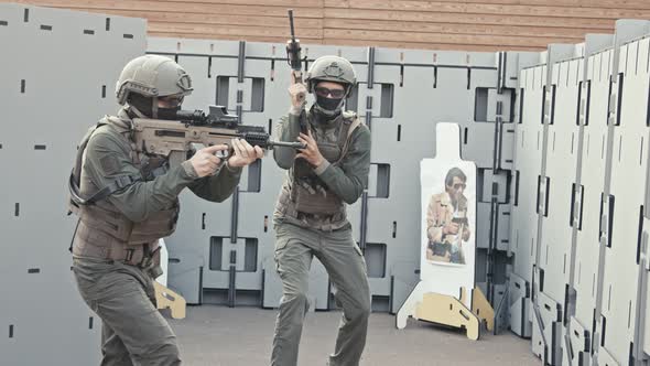 Slow motion of soldiers training in close quarters combat alt