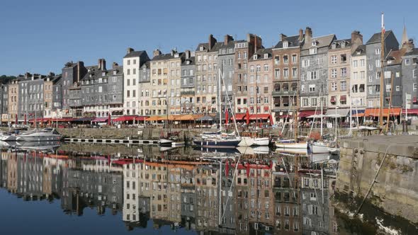 HONFLEUR, FRANCE - SEPTEMBER 2016 Slow tilt  on   architecture reflections of famous northern Norman