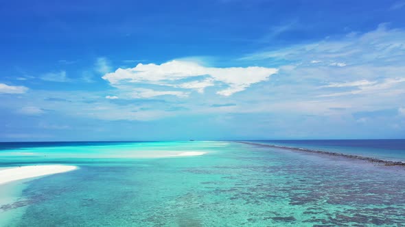 Luxury drone abstract shot of a paradise sunny white sand beach and aqua blue water background in hi