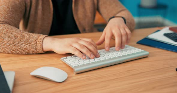 Closeup Shot of Hands of a Eurpean Man Working in an Office Tapping Fingers on