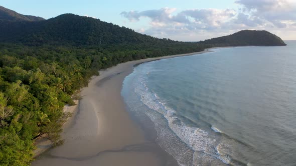 Cape Tribulation in Daintree Rainforest overcast aerial of empty beach and palm trees, Queensland, A