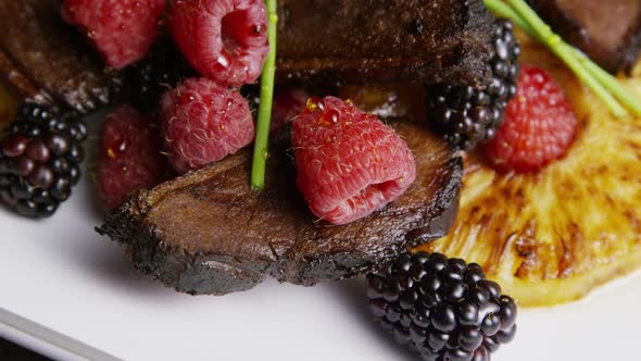 Rotating - smoked duck bacon with grilled pineapple, raspberries, blackberries and honey