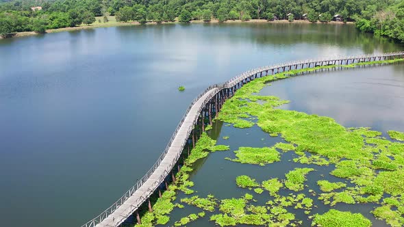 Nong Yai Pond and Wooden Bridge in Chumphon Thailand