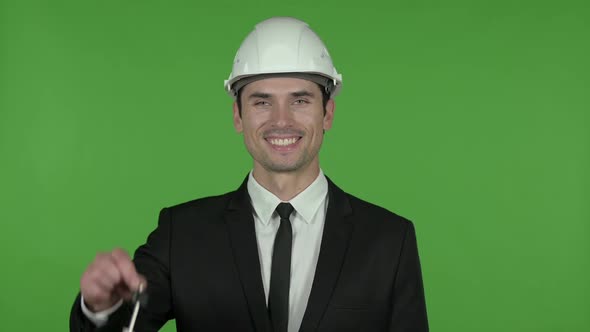 Young Engineer Showing House Key Chroma Key