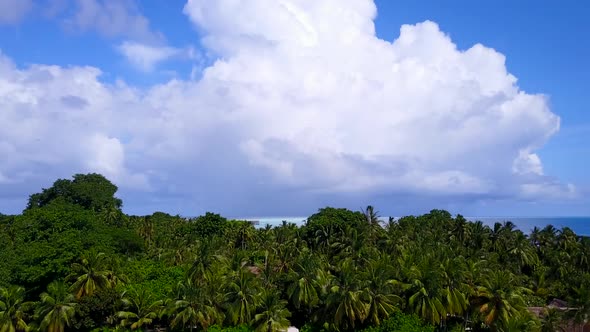 Aerial landscape of island beach by lagoon with sand background