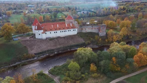 Bauska Medieval Castle Ruins Complex and Park From Above Aerial Shot 4K Video