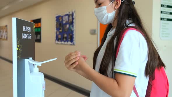 Girl Student Using Sanitize Coronavirus