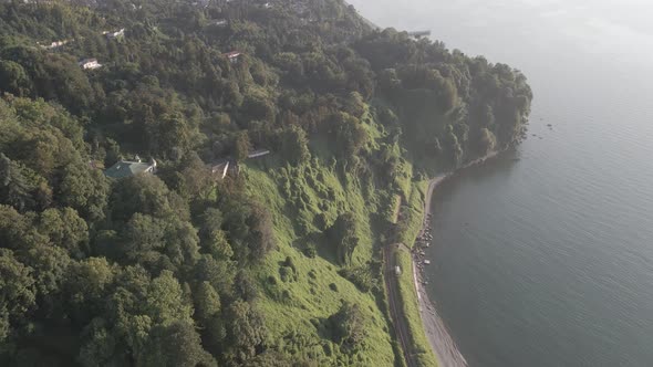 Aerial view of Green cape and Botanical garden of Batumi at sunset. Georgia 2021