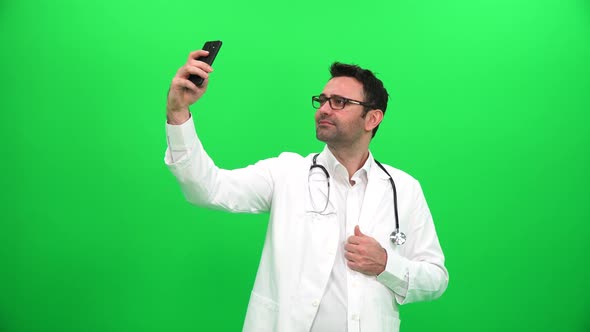 Doctor Taking Selfie on Green Screen