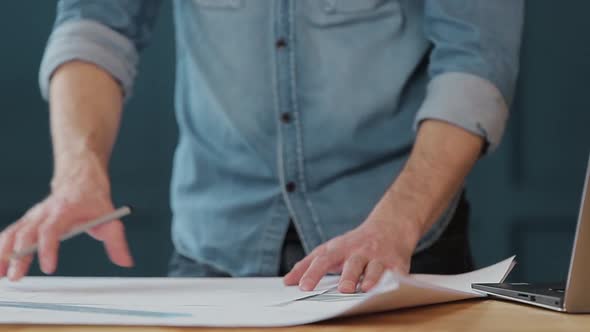 Architect Working on Blueprint with Spesial Tools and Pencil, Close Up. Male Architect at Work, Only