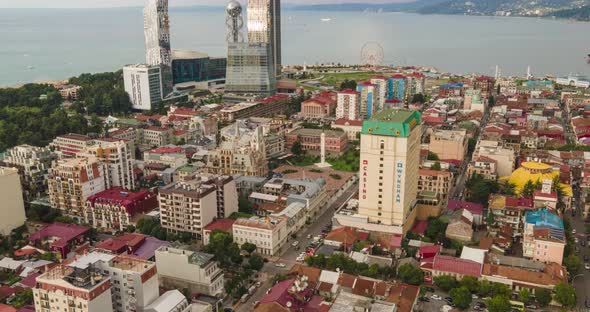 Aerial hyperlapse of Europe Square and Medea Statue in the center of Batumi