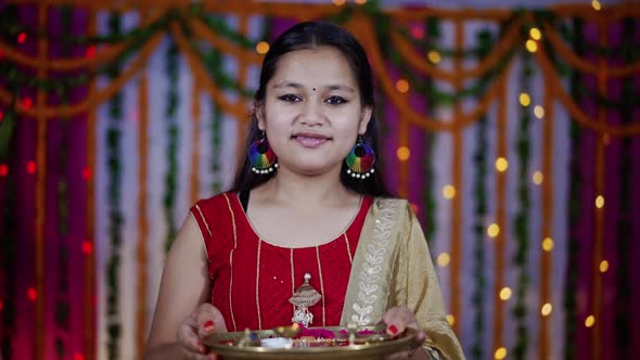Indian Girl in Her Home Wearing Ethnic Indian Dress During Raksha Bandhan