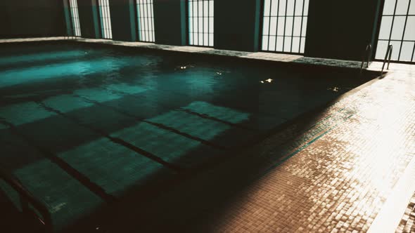 The View of an Empty Public Swimming Pool Indoors alt