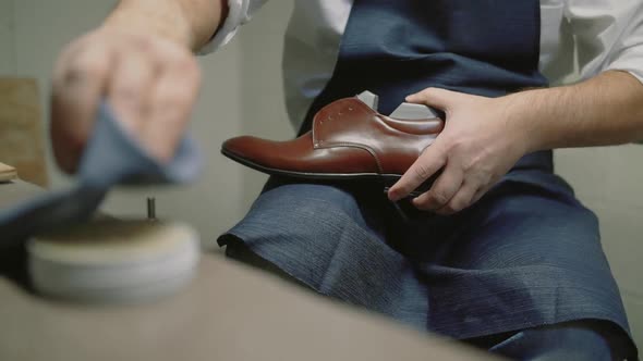 Slow Motion. Shoe Maker, Master, Craftsman, Workman Is Manufacture, Produce, Make Shoes in Small