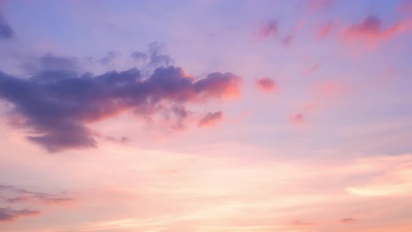 4K UHD : Time lapse of colorful sky during beautiful sunset.  Romantic clouds.