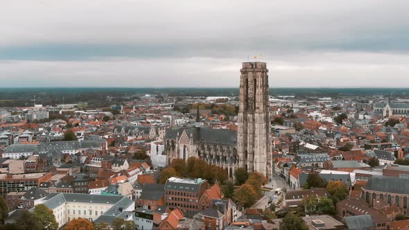St. Rumbold's Cathedral, Mechelen, Belgium. Aerial scenic cityscape. Orbiting shot