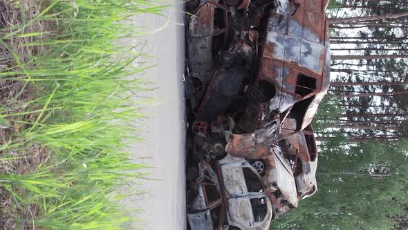 Vertical Video of a Dump of Cars Destroyed By the War in Ukraine