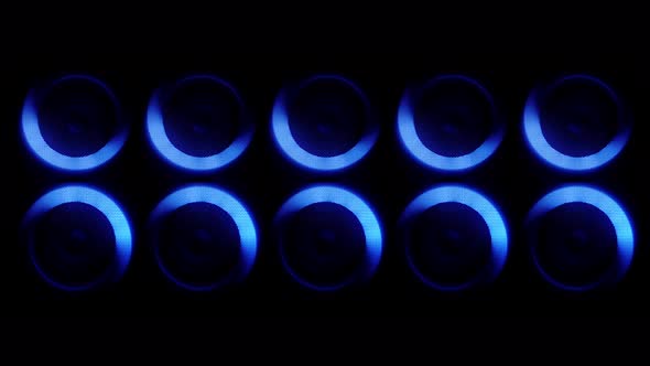 A Set of Modern Sound Speakers Illuminated By Rotating Neon Lights