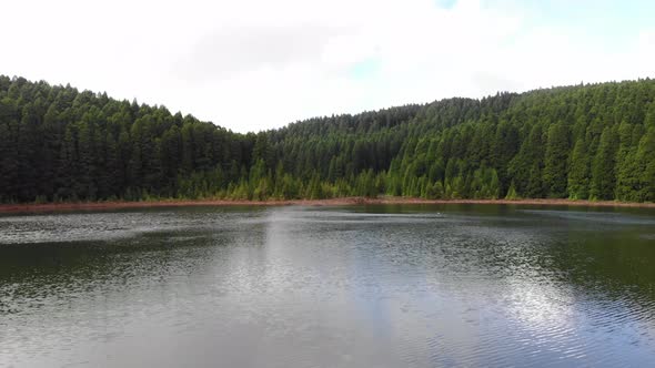 Fire Lagoon (Lagoa do Fogo) lush green shore in So Miguel Island, Azores, Portugal 