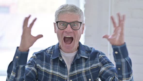 Portrait of Angry Casual Middle Aged Man Shouting