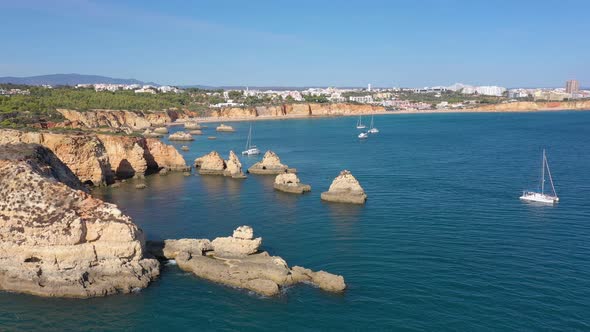 Aerial View Drone Footage of Alemao Beach Vao the Portuguese Algarve Coast and Holidaymakers