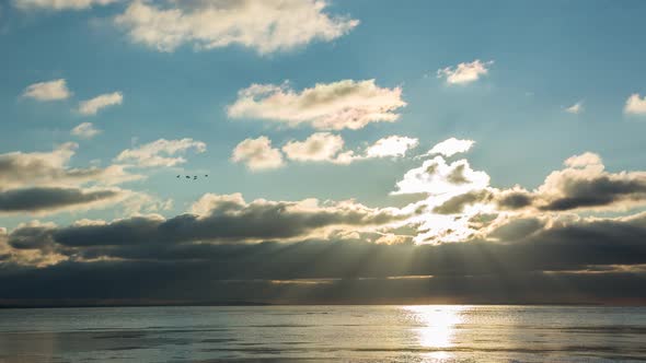 Timelapse Beautiful Blue Sky At Sunset With Fast Clouds Near The River, Winter