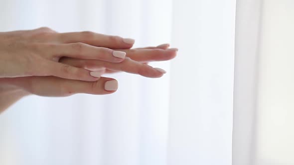 Beautiful female hands. Female hands Application Cream
