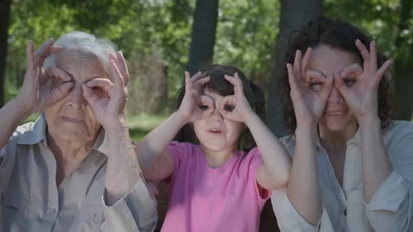 Family with Glasses. Fun with Grandma