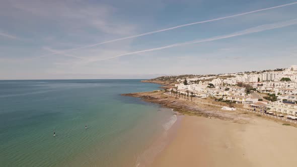 Pristine Praia da Luz facing the blue Atlantic ocean, Algarve - Aerial