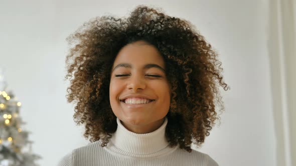 Lady with Kinky Hair and Perfect Teeth Starts Laughing