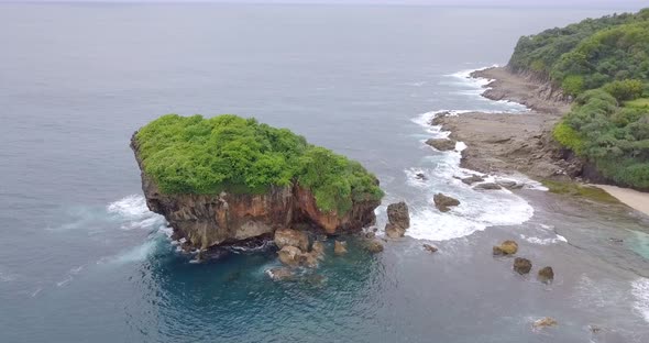 Aerial view natural landscape rocky small island in a beach in Indonesia, Southeast Asia