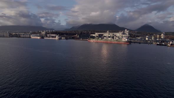 Cargo ships in Vancouver industrial and commercial port, Canada. Aerial drone view