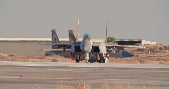 Israeli Air Force F15 fighters taxiing on the runway before takeoff