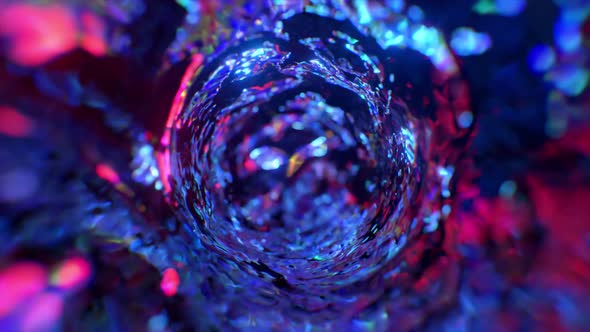 Swirling Water Funnel in Neon Lighting