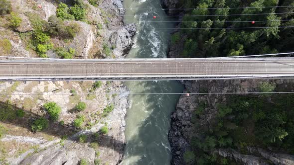 4k aerial footage of Hagwilget canyon bridge in northern British Columbia in summer of 2021. Gimbal