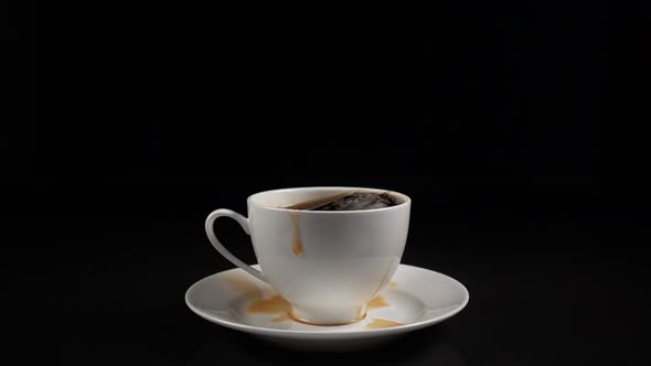 Sugar Cubes Dropped Into Coffee Creating Splash