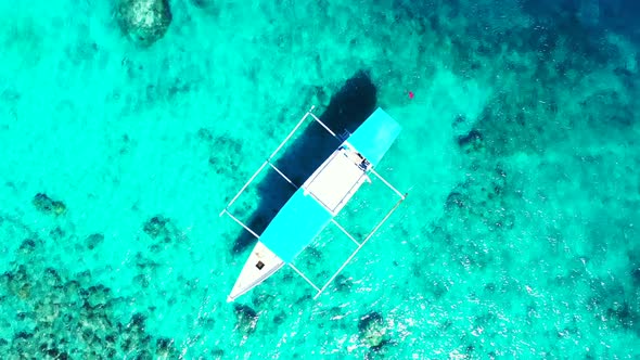 Aerial above sky of perfect tourist beach journey by blue lagoon and white sand background of a dayt