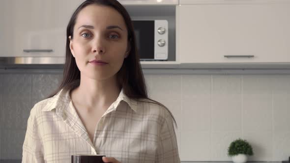 Brunette Woman with Coffee Mug