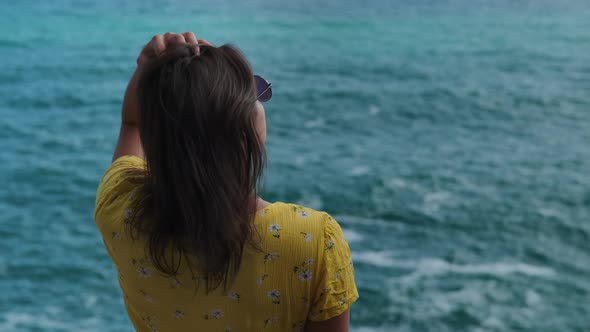 Relaxed Girl Contemplating the Sea