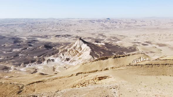 A panoramic view of stony desert. Unique relief geological erosion land form. National park Makhtesh