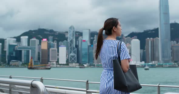 Woman look at view in Hong Kong