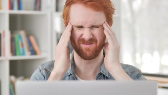 Headache Stressed Casual Redhead Man at Work