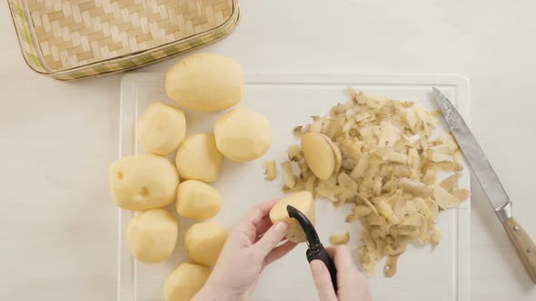 Step by step. Peeling Yukon gold potatoes for classic mashed potatoes.