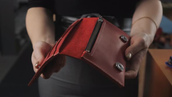 Woman Demonstrating Women's Leather Red Wallet Handmade Closeup