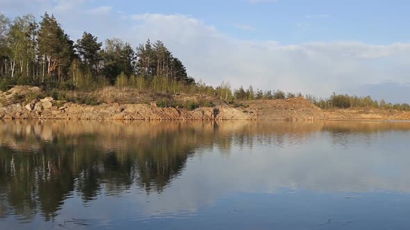 Lake With Rocks on the Beach