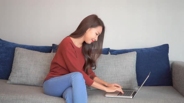 Young asian woman use laptop