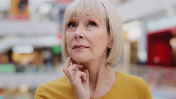 Headshot Pensive Mature Caucasian Woman Puzzled Thinks Immersed in Thoughts Solves Problem