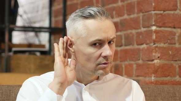 Middle Age Man Listening Gesture