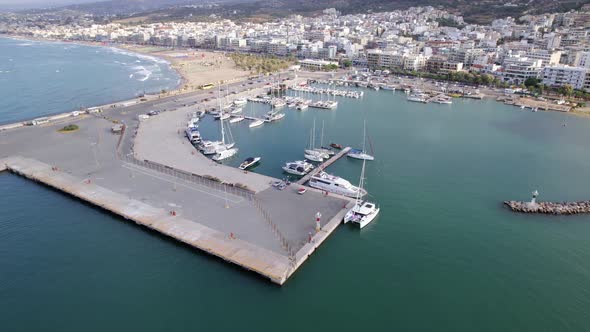 Aerial Drone view of famous Greek island Crete, with Mediterranean architecture, marina and yachts